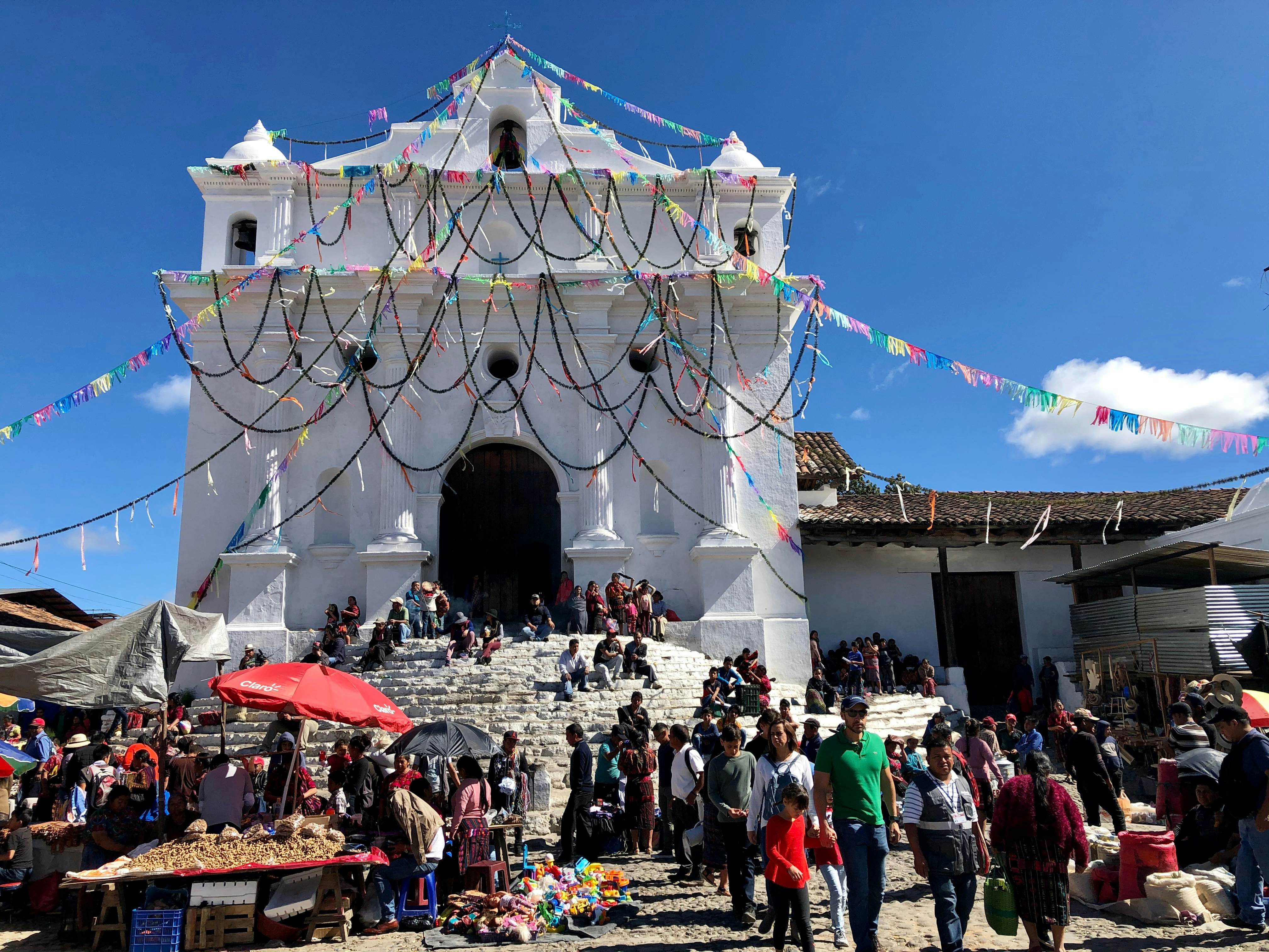 Chichicastenango, Quiche / Guatemala - CERCA December 2019: Sceneries of the city center of Chichicastenango during the festival of Saint Thomas (Fiesta de Santo Tomas)..; Shutterstock ID 1619560192; your: Erin Lenczycki; gl: 65050; netsuite: Online Editorial; full: Destination update